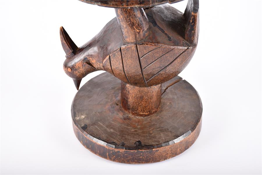 A late 19th / early 20th century carved tribal hardwood stool, possibly West African  with - Image 10 of 11