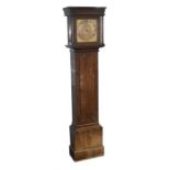 A Georgian oak cased longcase clock The silvered dial with black numerals and incised detail, set