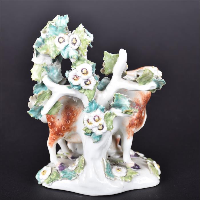 A Derby porcelain cow and calf resting before a flowering tree on an oval grassy base applied with - Image 2 of 3