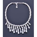 A Swarovski white metal and crystal drop pendant necklace set with clustered round cut stones and