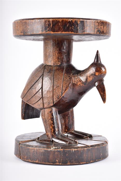 A late 19th / early 20th century carved tribal hardwood stool, possibly West African  with - Image 5 of 11