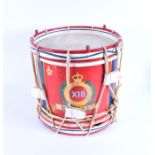 A 20th Century hand painted military snare drum detailing insignia of the 13th Hussars (
