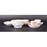 Matched New Hall teawares in the Yellow Shell pattern, c1800.  comprising three teacups, (6 cm high)