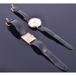 A 1930s 9ct gold wristwatch with white enamel dial and black Roman numerals, on a later strap,