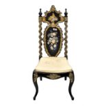 A small Victorian black lacquer mother-of-pearl inlaid side chair in the manner of Jennens &