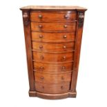 A large Victorian mahogany Wellington chest of eight graduating bow-fronted drawers  with locking