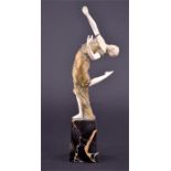 Georges Omerth (fl.1895-1925) French a bronze and ivory figure of a dancing girl, the female