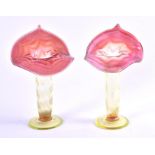 A pair of almost identical Victorian Jack in the Pulpit glass vases each with vaseline-tinted