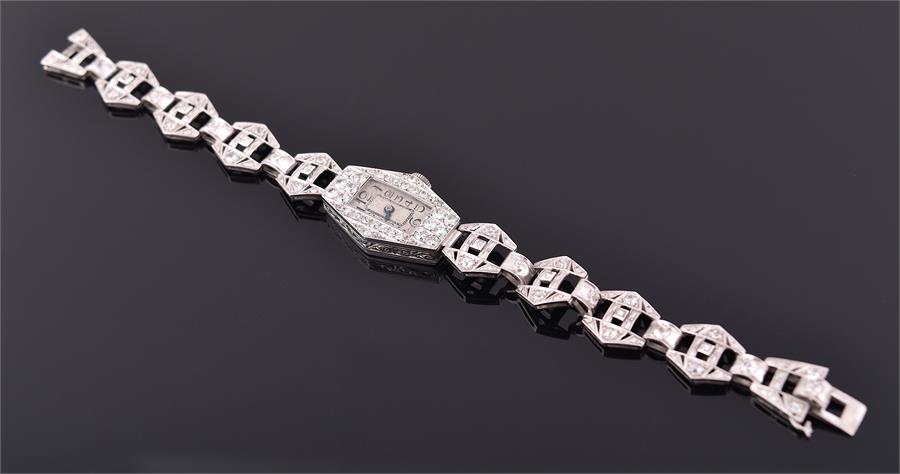 An Art Deco white gold (tested) and diamond ladies cocktail watch the hexagonal case with
