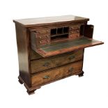 A 19th century mahogany secretaire chest the plain top over a secretaire drawer with fitted interior