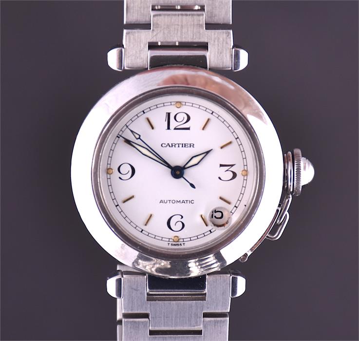 A Pasha de Cartier stainless steel automatic wristwatch the signed white dial with Arabic numerals