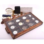 A quantity of various pocket watches in wooden display case together with a silver compact, a
