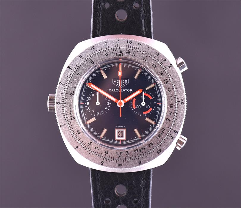 A rare 1970s Heuer Calculator automatic chronograph wristwatch the signed blue dial with baton