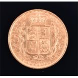 A Victorian full sovereign 1864, with shield back, 7.8 grams.