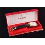 An Omega De Ville quartz wristwatch the white dial with black Roman numerals and date aperture, in