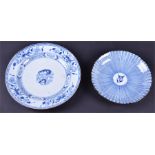 An 18th century Chinese porcelain blue and white plate  with central painted foliate decoration