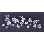 A selection of small Swarovski Crystal figurines to include a pig and piglet, two swans, a deer,