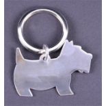 A Radley silver keyring in the shape of a Scottie dog, approx. 4 cm long, boxed.