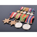 A WWII Medal group comprising The Defence Medal, The War Medal, The 1939-1945 Star, and The