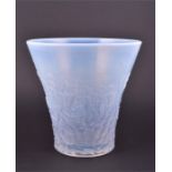A 20th century moulded opalescent glass vase, attributed to Baralac believed to depict 'The Last