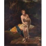 A 19th century nude female  standing in a wooded glade in the Venus Pudica pose, her clothes in a