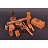 A selection of various treen/manchton wear items to include a pair of glove stretchers, various