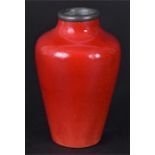 A Royal Doulton Flambe vase  of tapering baluster form, terminating in an applied pewter collar,