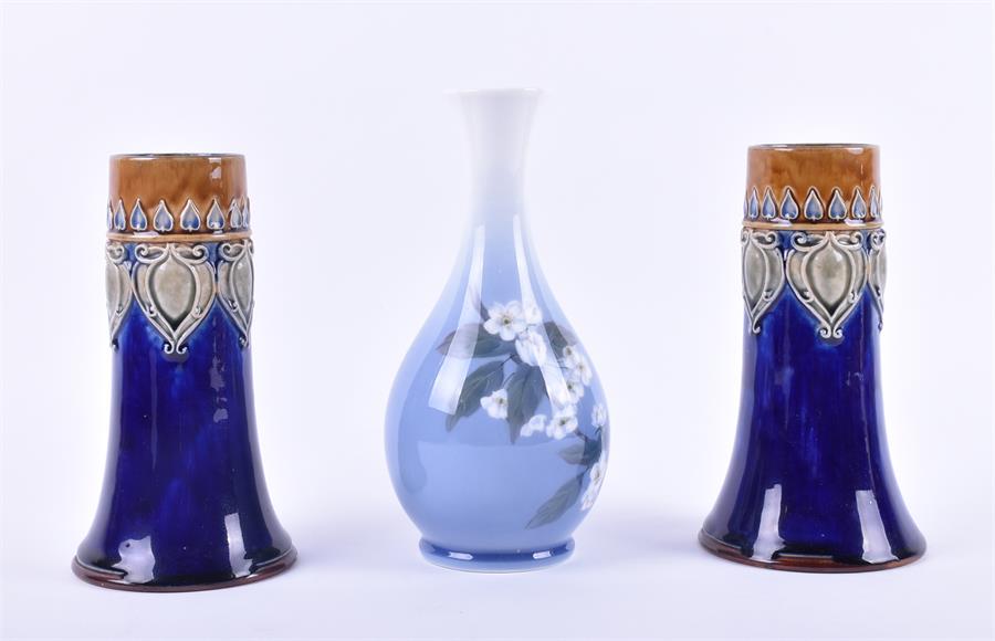 A Royal Copenhagen bottle vase decorated with blossom, 21 cm high, together with a pair of Royal - Bild 5 aus 12
