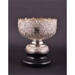 An Indian silver rose bowl apparently unmarked, the globular body chased with scrolling leaves and