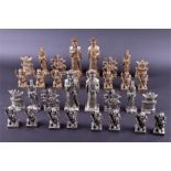 An unusual large-sized Chinese bronze and silvered bronze chess set comprising of all sixteen