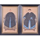 An associated pair of Chinese ancestor paintings on parchment one of a male, the other a woman, each