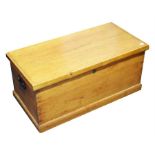 A Victorian pine blanket box the interior with candle box and wrought iron carrying handles. 83 cm