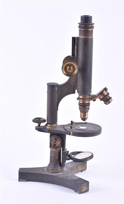 A 19th century scientific microscope  stamped R & J Beck to tricorn shaped weighted base, 34 cm - Image 9 of 12