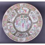 A large Cantonese Famille verte bowl heavily decorated with hand painted figures and birds set