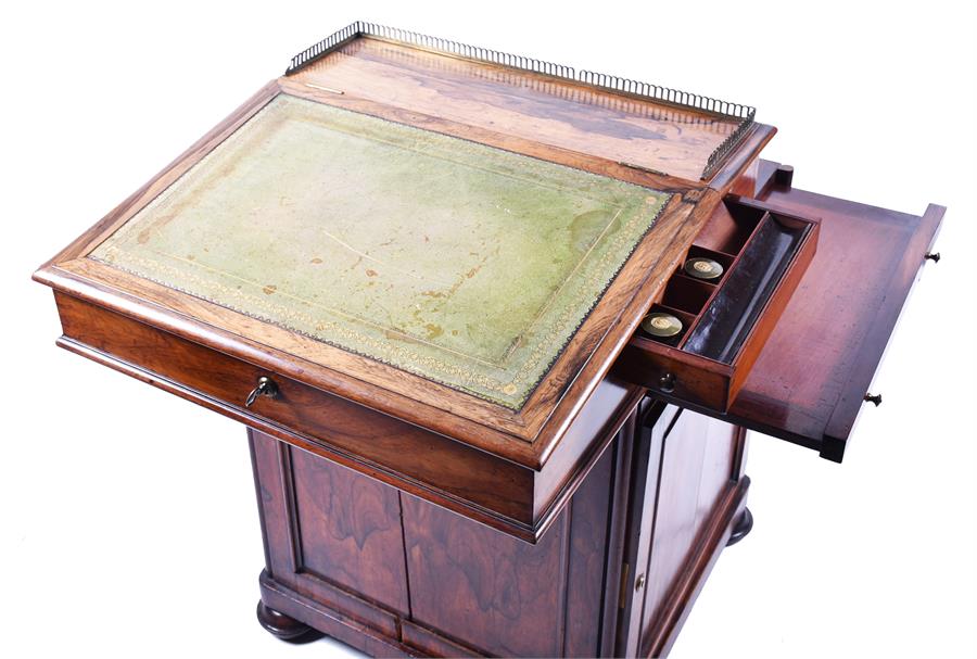 A Victorian rosewood davenport the green tooled leather top with brass gallery, opening to reveal - Image 4 of 4