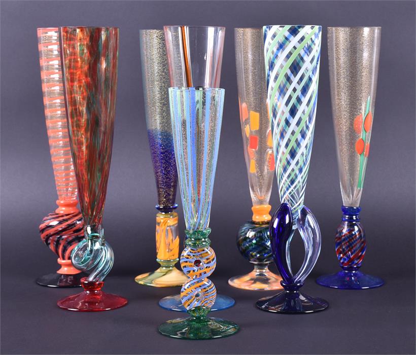 A collection of seven Carlo Moretti  Murano glass champagne flutes Italian, 1999, all hand blown and