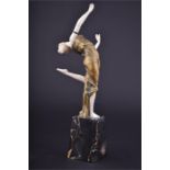 Georges Omerth (fl.1895-1925) French a bronze and ivory figure of a dancing girl, the female