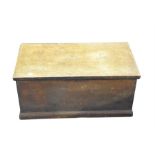 A Victorian pine blanket box of simple form, the top opening to reveal candle tray, 81cm wide.