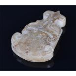 An old Chinese mutton fat jade pendant  inlaid with gold, in the style of the Han period, of