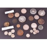 A collection of assorted coinage including three George V silver half crowns, several Roman coins,