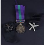 An Elizabeth II General Service medal with Malaya clasp the inscription around the rim of the