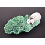 A late Victorian Minton majolica porcelain bon bon dish in the form of a white rabbit sitting on a