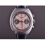 A 1970s Heuer manual chronograph wristwatch the signed silvered dial with grey tachymeter bezel, and