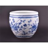 A Chinese blue and white porcelain fish bowl with floral decoration and stylised borders, 25cm