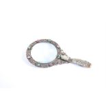 A Chinese jade-handled brass magnifying glass the carved jade handle with floral decoration, the