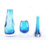 Three pieces of kingfisher blue Whitefriars glass to include a tapered vase of cylindrical form,
