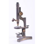 A 19th century scientific microscope  stamped R & J Beck to tricorn shaped weighted base, 34 cm