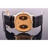 An 18ct gold Chopard dual time dress wristwatch the gold dial with twin watch faces with baton