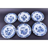 A matching set of six Chinese export porcelain blue and white plates all with hand painted foliate