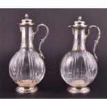 A fine pair of late 19th / early 20th century French silver mounted glass liquor jugs 925